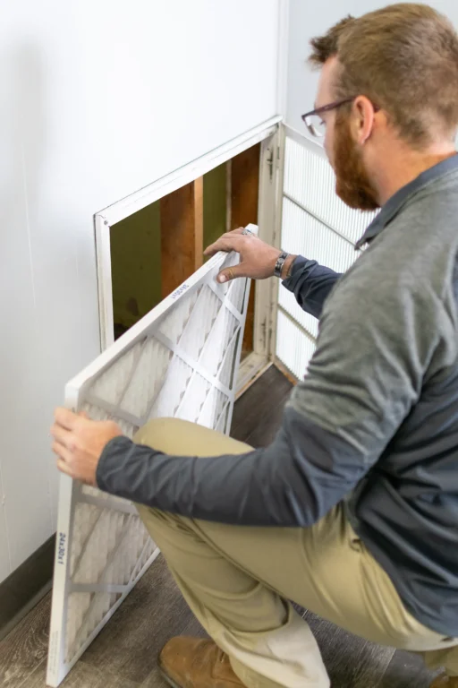 changing ac filter-lorenz plumbing heating and air-springfield