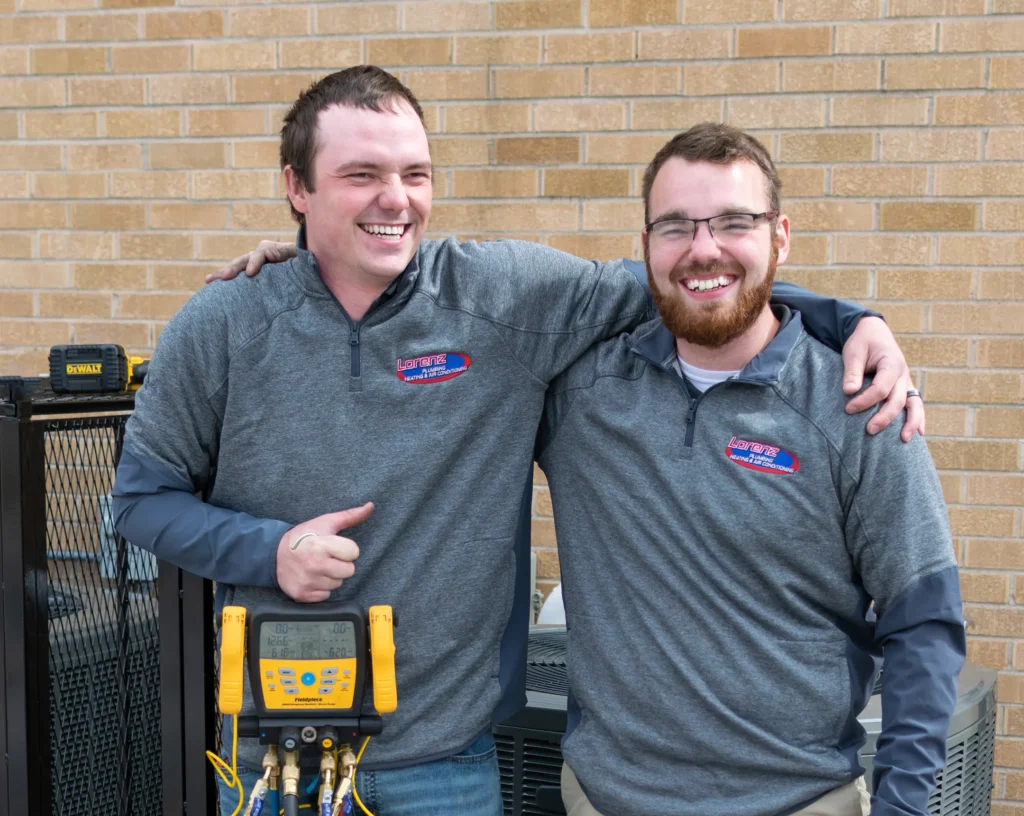 two team members smiling-lorenz plumbing heating and air-springfield