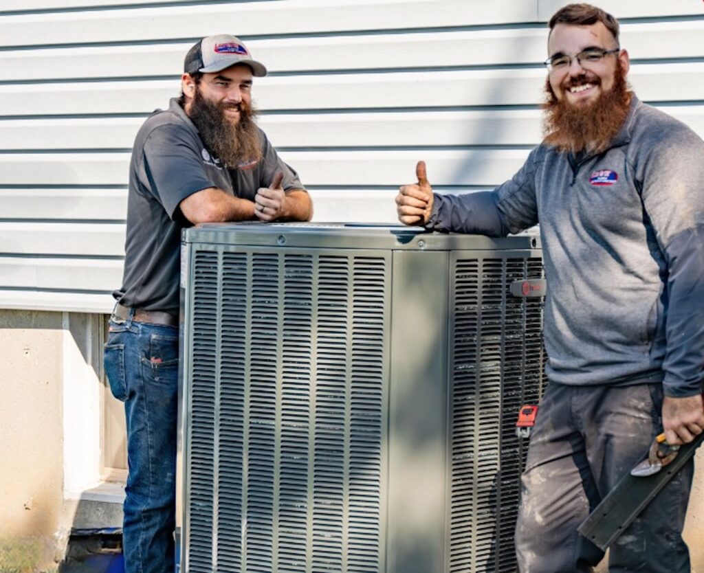 two lorenz workers smiling