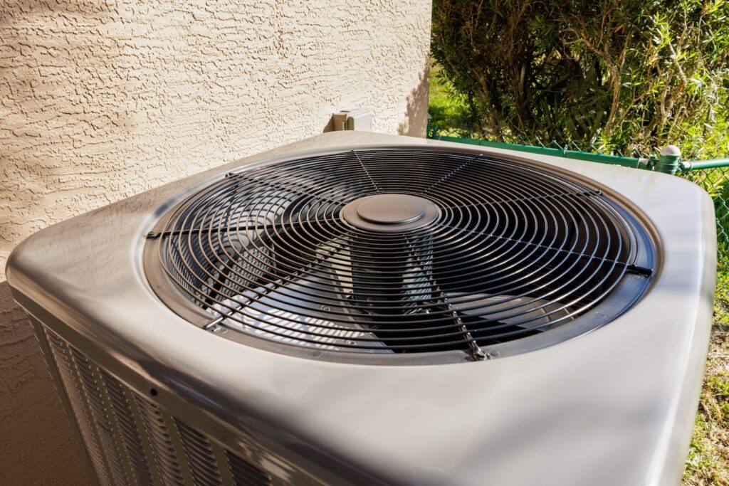 Modern residential HVAC air conditioner unit fan.
