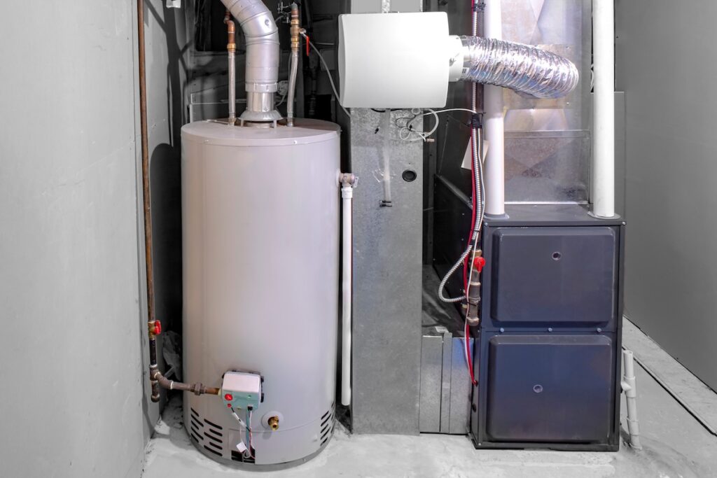 A home high efficiency furnace with a residential gas water heater and humidifier.