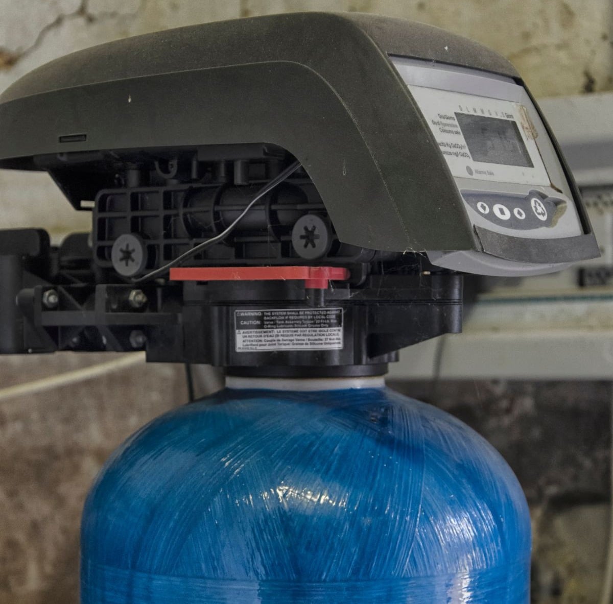 salt free water softener blue filter inside house