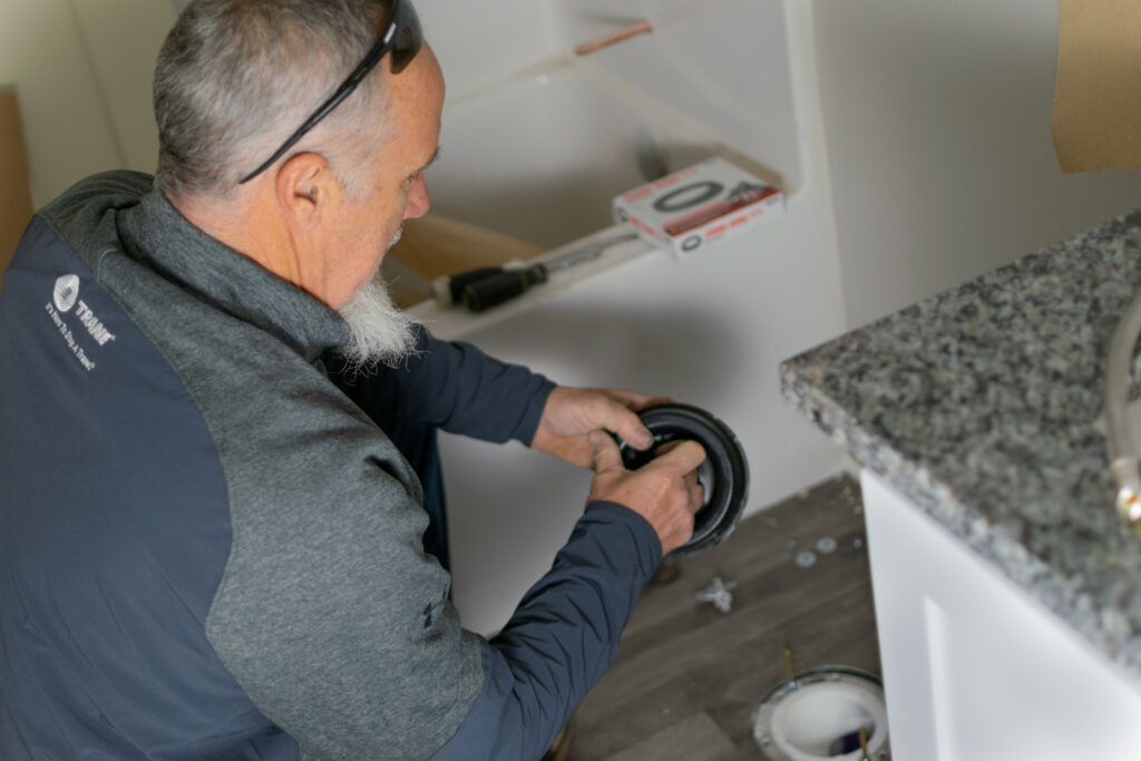 Lorenz Plumbing Heating and Air Conditioning worker