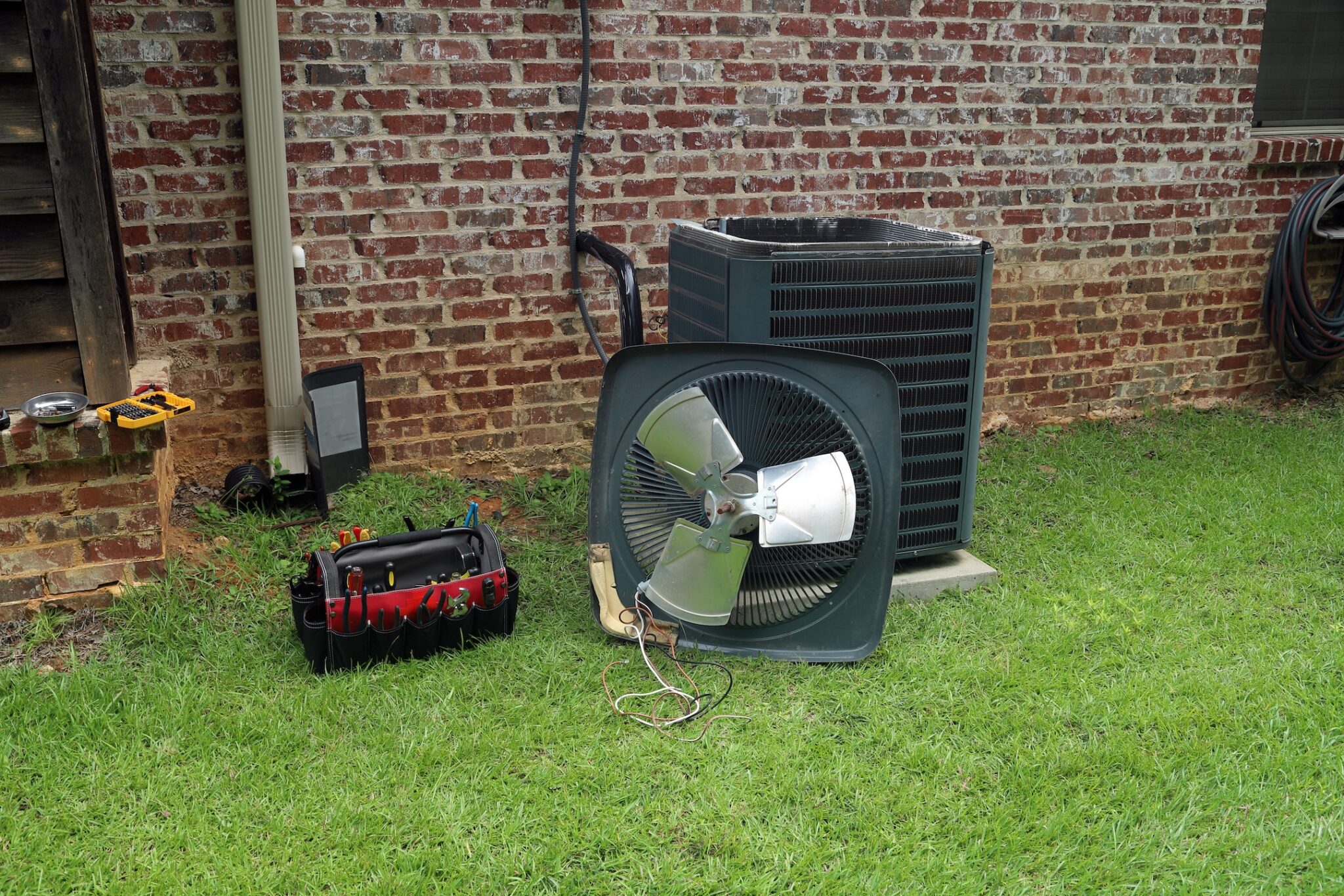 ac-repair-in-progress-in-forsyth