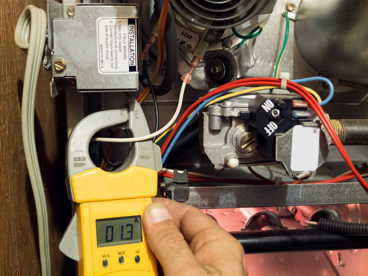 closeup-of-technician-testing-furnace