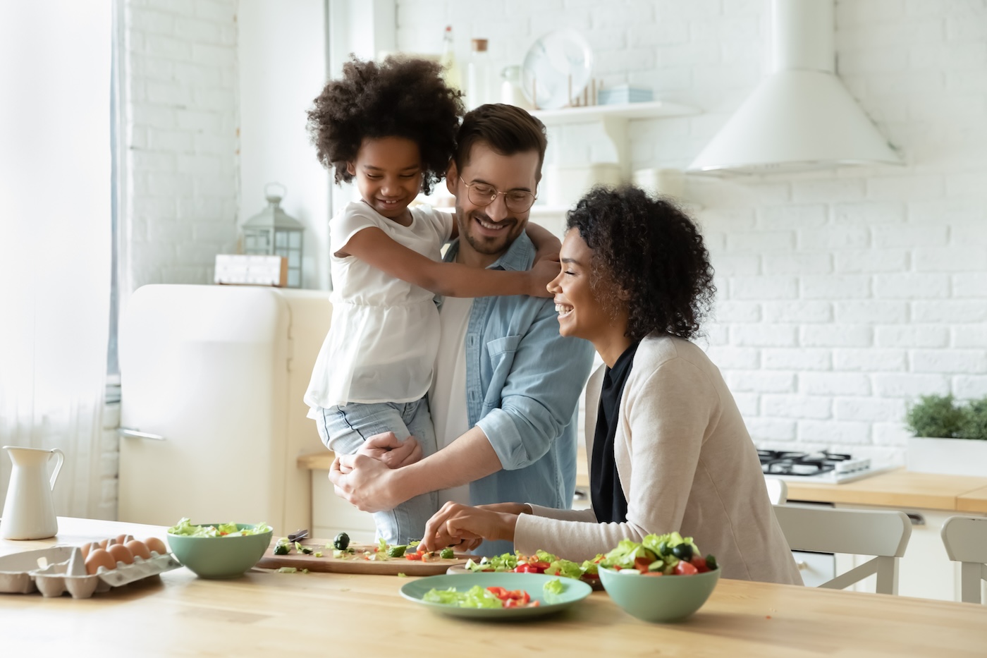cute-family-cooking-food-in-home