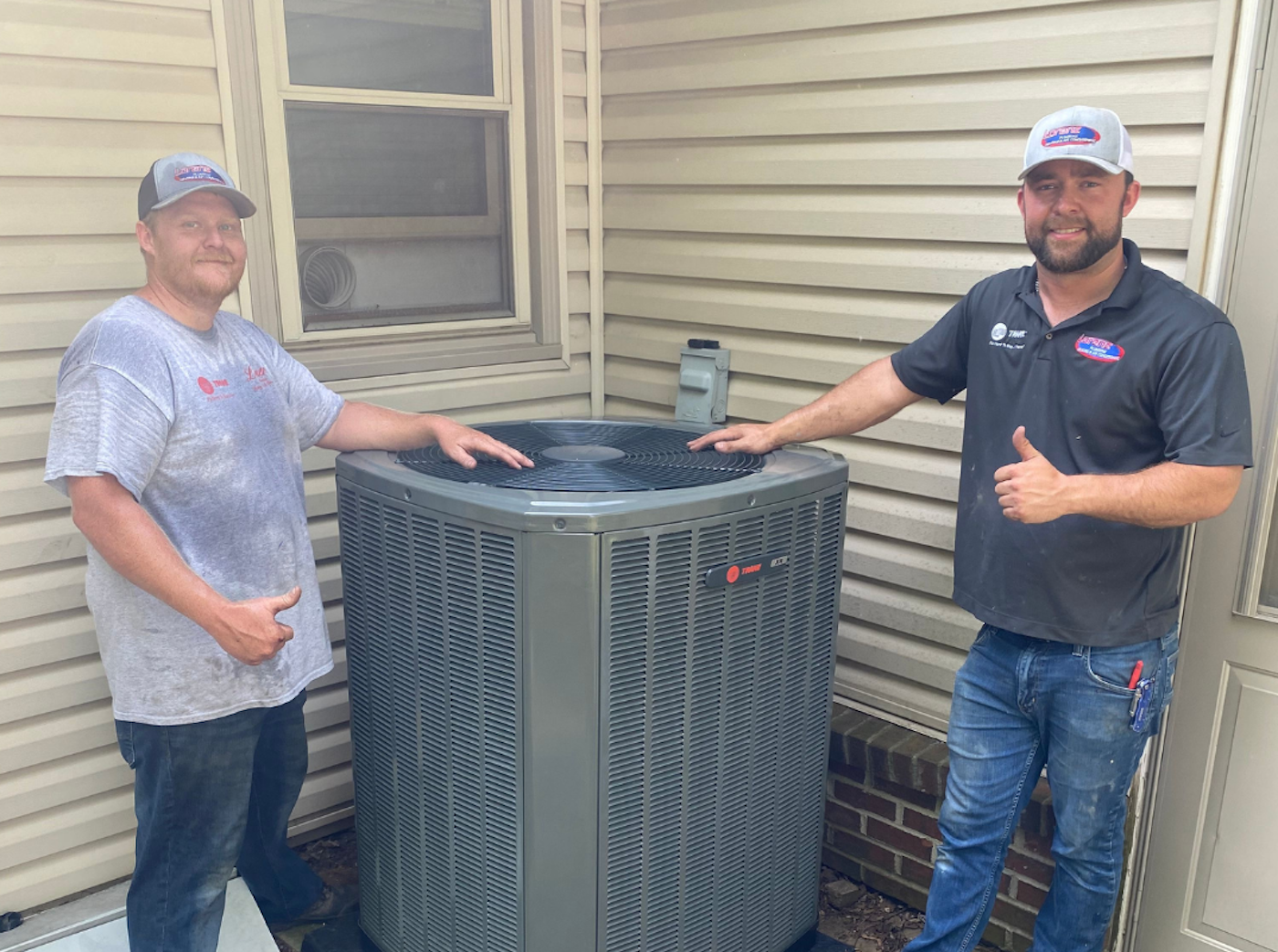 lorenz-workers-installing-ac-replacement-unti