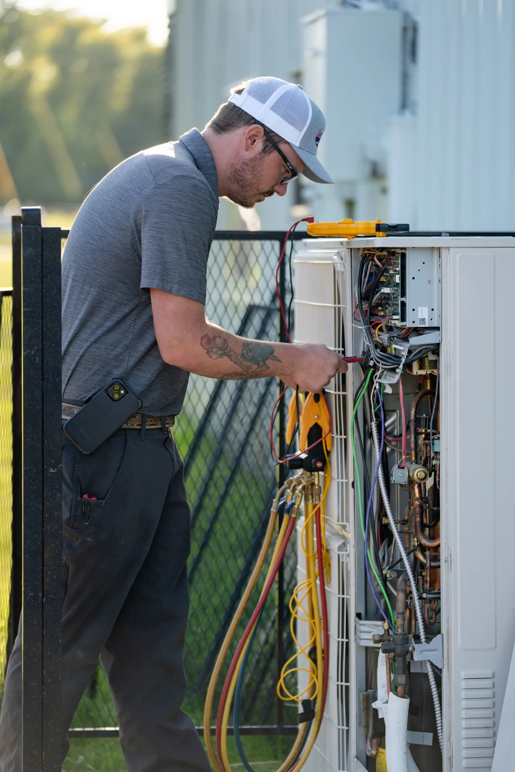 team-member-working-on-wiring-lorenz-plumbing-heating-and-air-springfield