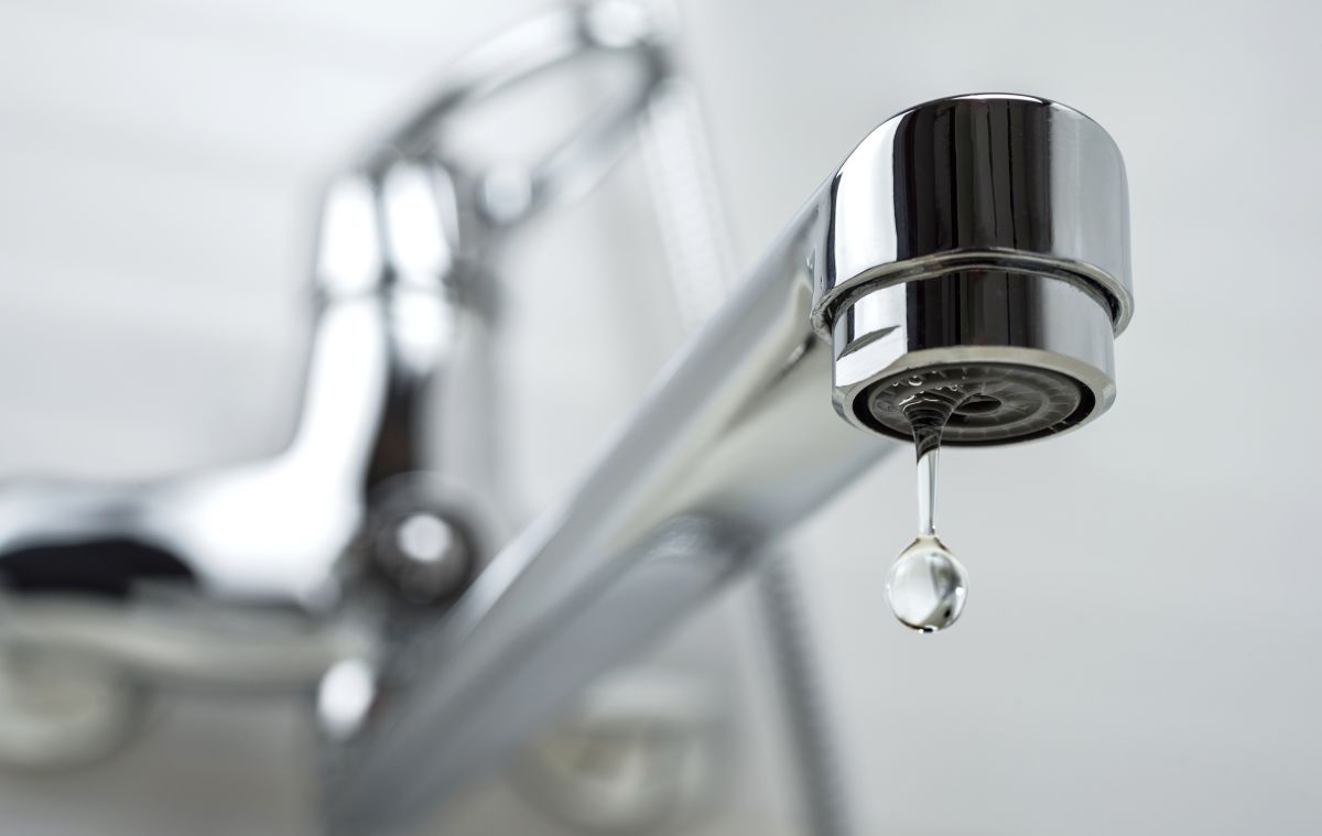 why-is-my-water-bill-so-high-faucet-leaking-drop-of-water