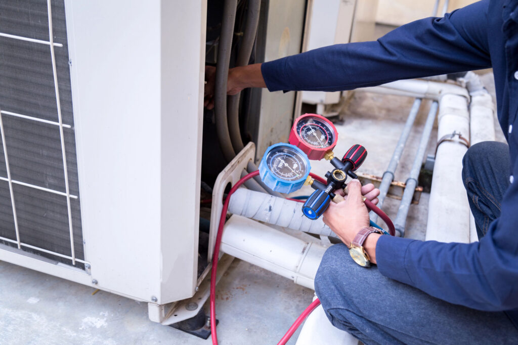 Technician-is-checking-air-conditioner